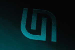 Consultancy brand identity design embossed logo
