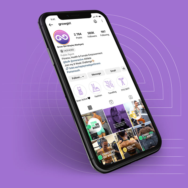 Cellphone tilted at a 30 degree angle on a purple background